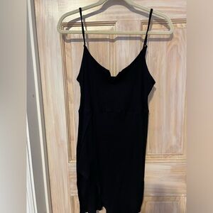 Ribbed Black mini dress with notch front and slit size XL